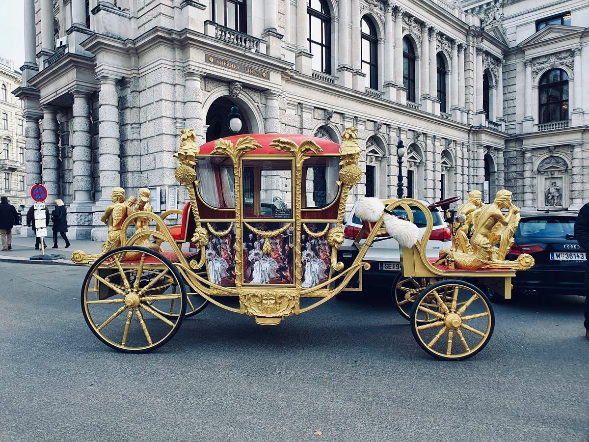 This is gold state coach carriage with Electric power driving in Europe taken by Royal E-car tour